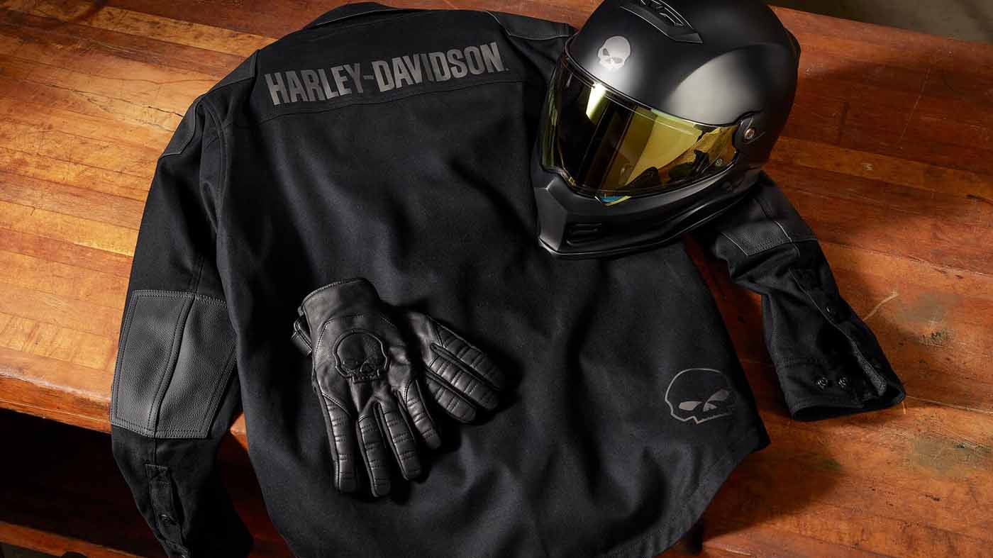 man standing by bike